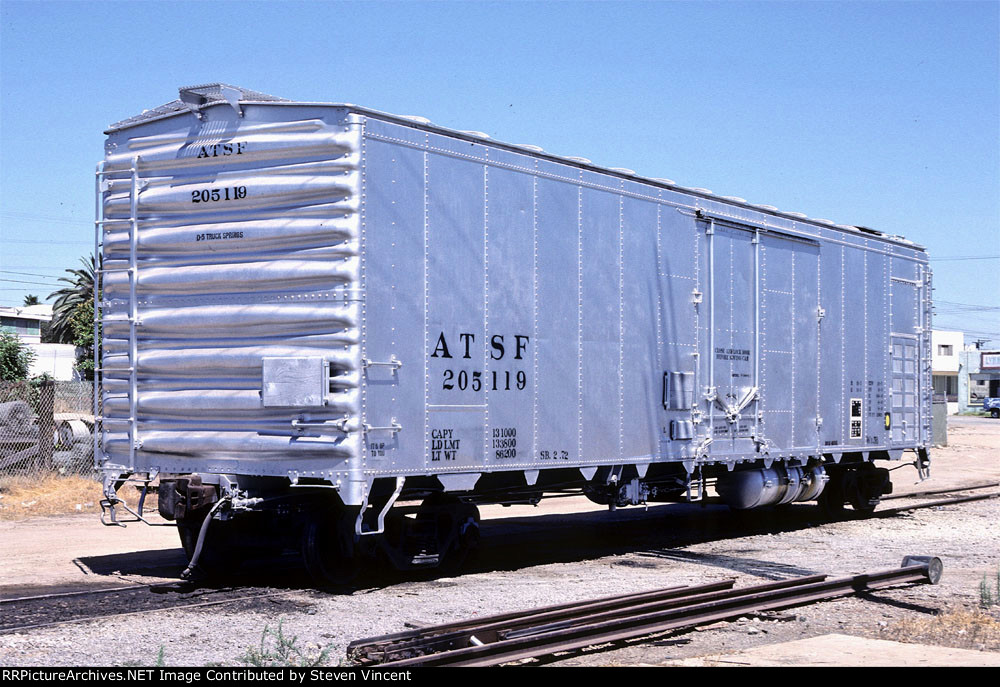 Ex Santa Fe mechanical reefer here as MW materials car ATSF #205119